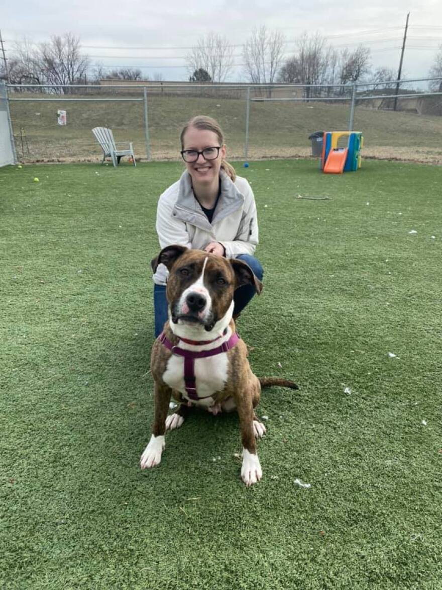 Olivia Houck poses for a picture with her other pet, Juno, who she adopted at the beginning of the pandemic when she knew she'd have time at home with her new dog.