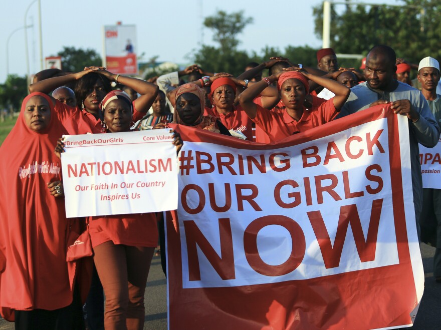 #BringBackOurGirls" campaigners participate in a lamentation parade in Abuja, in early November, as more towns in Nigeria come under attack from Boko Haram.