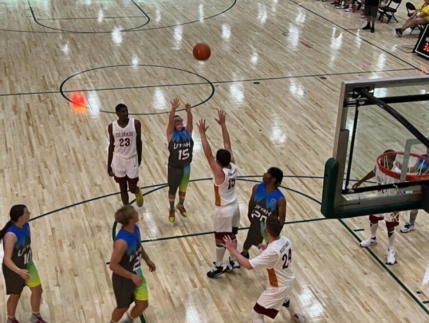 Wasatch's Tate Davies (Utah 15) puts up a shot against Colorado on Monday in a Special Olympics pool-play game.