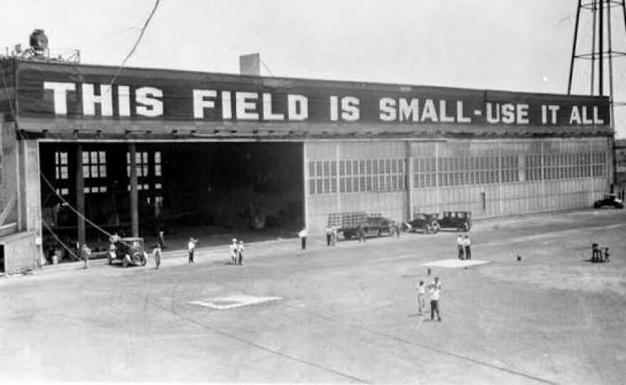 Hangar at McCook Field in Dayton, Ohio, displaying the slogan, "This Field Is Small—Use It All."