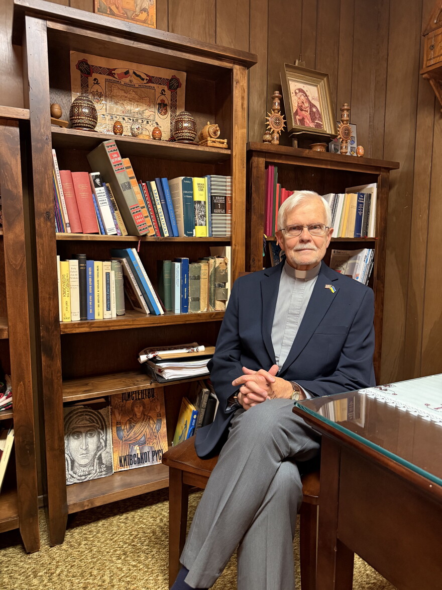 Deacon Eugene Logusch poses in St. Mary's Assumption Ukrainian Catholic Church in south St. Louis County on Wednesday. He is praying that Ukrainians who came here after the fallout of the Russia-Ukraine war in 2022 will have their protected status renewed, because it is set to expire on Oct.19.