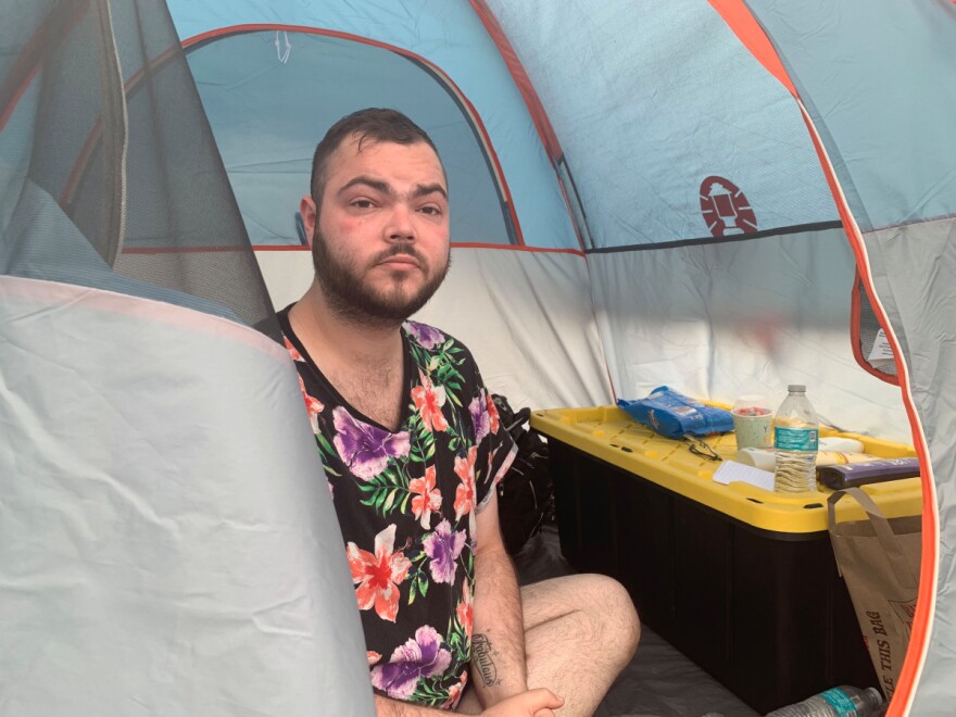 Matt Roberts says he struggled to find full-time work in Santa Rosa as businesses shut down amid the pandemic. Having access to shelter, showers and laundry service at the Finley Park tent city provided enough stability that he has since landed a job as a retail clerk.