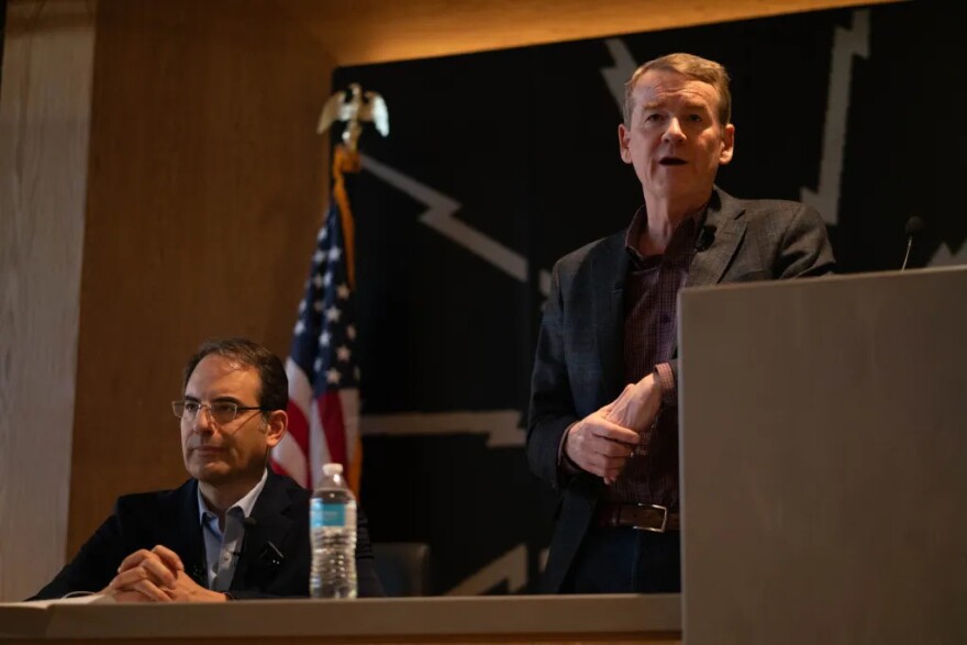 Colorado Attorney General Phil Weiser, left, and U.S. Sen. Michael Bennet at a debate hosted by the Colorado Young Democrats in Denver, Colorado, on Saturday, Jan. 10, 2025.