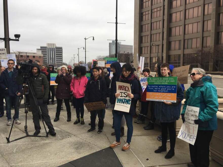 Supporters rally for Yousef Ajin and family ahead of his deportation hearing in Detroit.