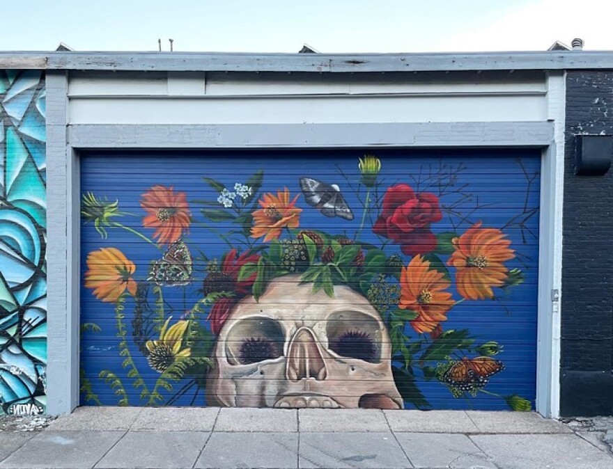 Richmond, Virginia-based artist Nico Cathcart painted "Cosmos," part of a series of murals about the human impact on the natural environment, in 2021 for Wall\Therapy.