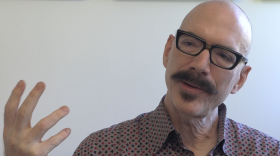 Dean Tolchinsky talks about how horror movies express deeper social themes, including mental health and racism. Horror movies also create a sense of community, because people still go out to movie theaters to see horror films.