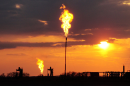 Flaring natural gas (largely methane) at a well site in North Dakota in 2014. The Bureau of Land Management relaxed rules regulating flared, leaked and vented methane from oil and gas operations on federal and tribal lands.