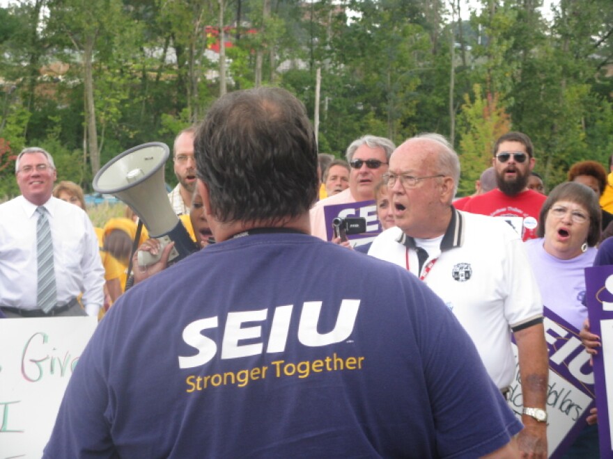 Union members rally outside of Express Scripts HQ