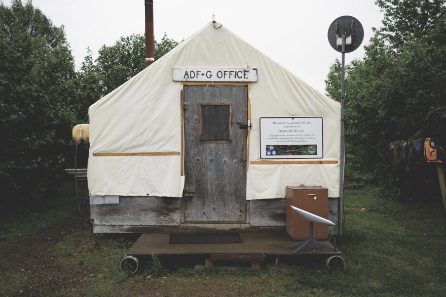 A canvas tent on site houses computers that the sonar units transmit data to, as well as a two-way radio for relaying data to the Dillingham Fish and Game Office.