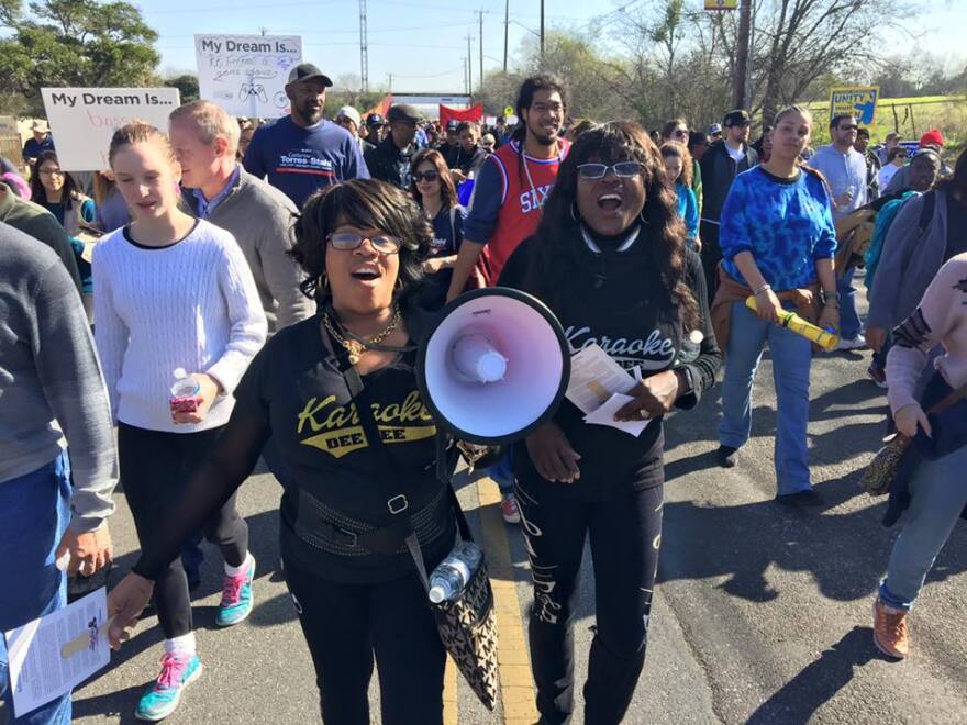 Marchers participate in the MLK March in January 2020.