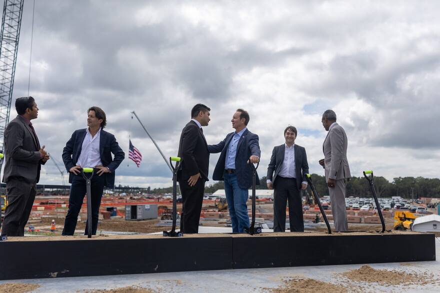 Gov. Jeff Landry talks with Hut 8 CEO Asher Genoot at the groundbreaking of the company’s West Bend data center in West Feliciana Parish, Louisiana, on Monday, October 5, 2026.