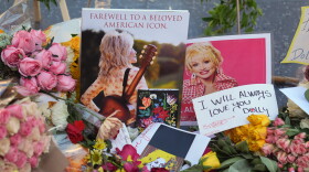 Flowers, notes and photos are left on Dolly Parton's star on the Hollywood Walk of Fame on Wednesday, Aug. 26, 2026, in Los Angeles.