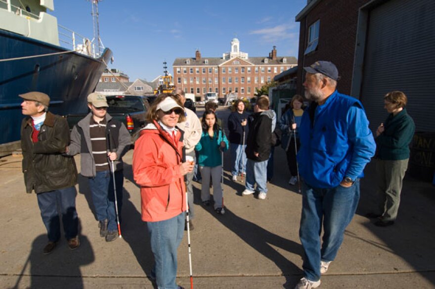 Amy Bower (foreground) leads a group of students from Perkins School for the Blind.