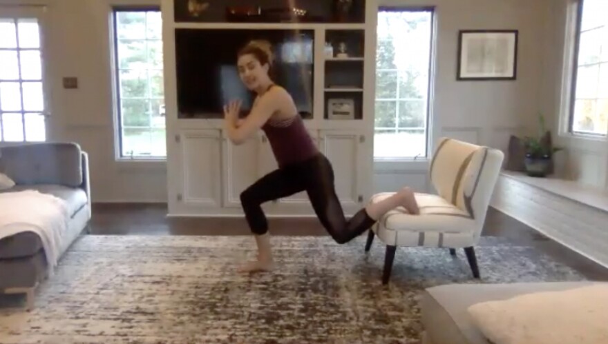Elizabeth Heidari teaches an exercise class through Zoom, a videoconferencing platform.