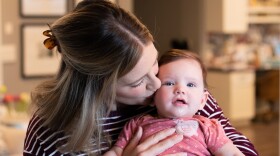 Marci Deck and her daughter, Elliott, at their home in Tulsa. Deck has been back to work as an assistant professor at the University of Oklahoma’s School of Community Medicine in Tulsa for two months after she took parental leave.