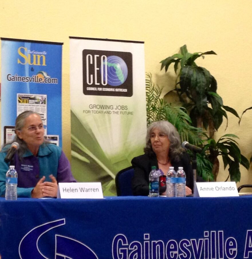 Helen Warren (left) debates issues facing the Gainesville community with commission-opponent Annie Orlando (right) at a forum on Thursday.