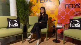 San Antonio chef Jennifer Hwa Dobbertin poses with her Thai Noodle Crunchwrap Supreme. She reimagined Taco Bell's iconic Crunchwrap as part of the company's inaugural TBX Program.