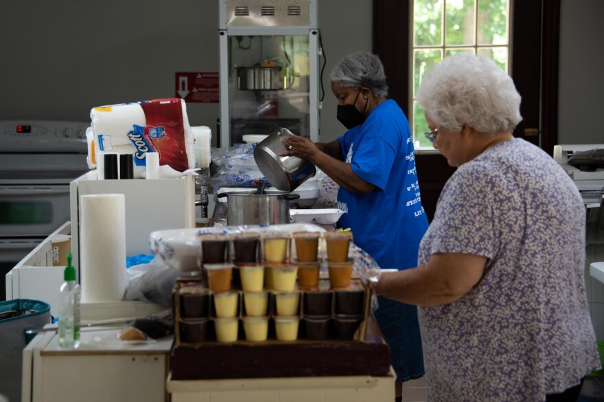 Havanna Thacker’s mother and an older couple who live near the former high school make hot food to deliver to people up in remote mountain communities still without power and water.