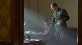 Nahuel Pérez Biscayart and Lars Eidinger in Persian Lessons (2020).