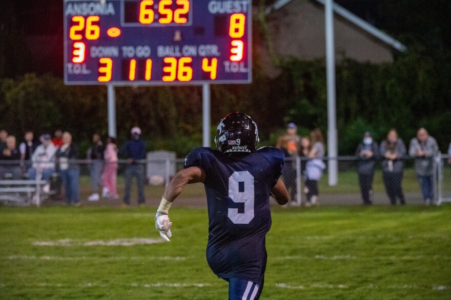 Senior running back Darell McKnight (9) completes another touchdown run in the 4th quarter. In total he ran 257 yards for 4 touchdowns.