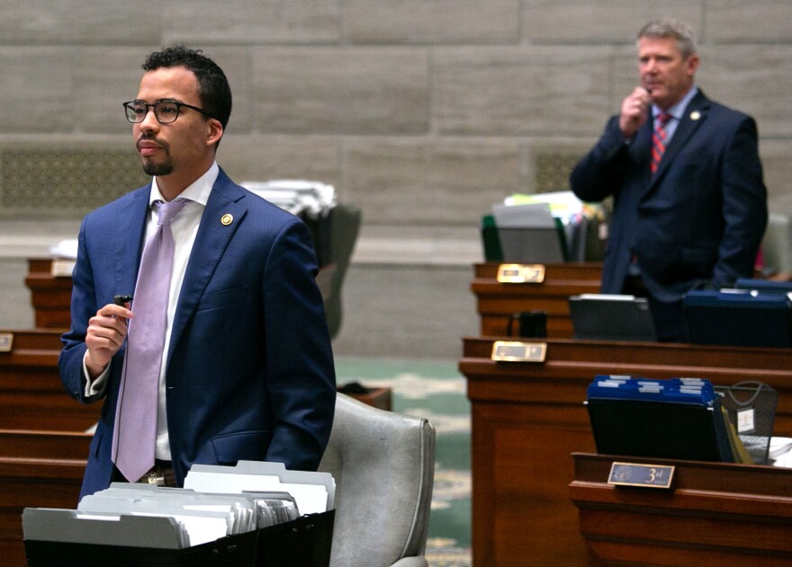 State Sen. Steve Roberts, D-St. Louis, speaks with Sen. Doug Beck. D-Affton, during the last day of the 2021 legislative session on May 14, 2021.