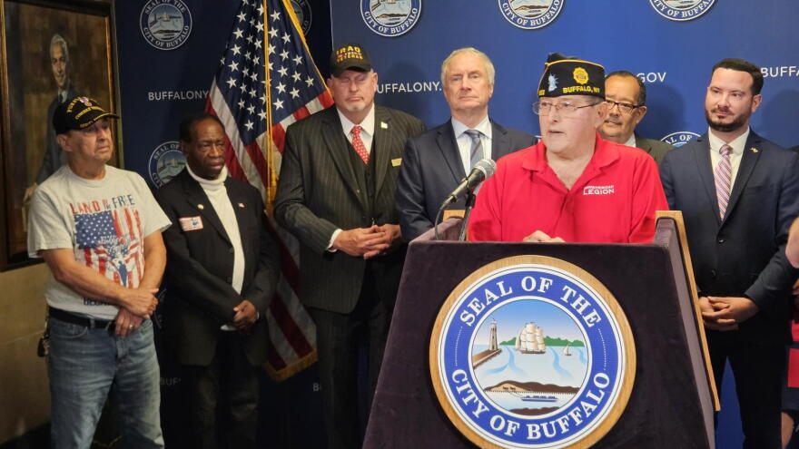 Gabriel Rodriguez American Legion Post Commander John Samabria, standing at lectern, describes his goals for veteran advocacy.