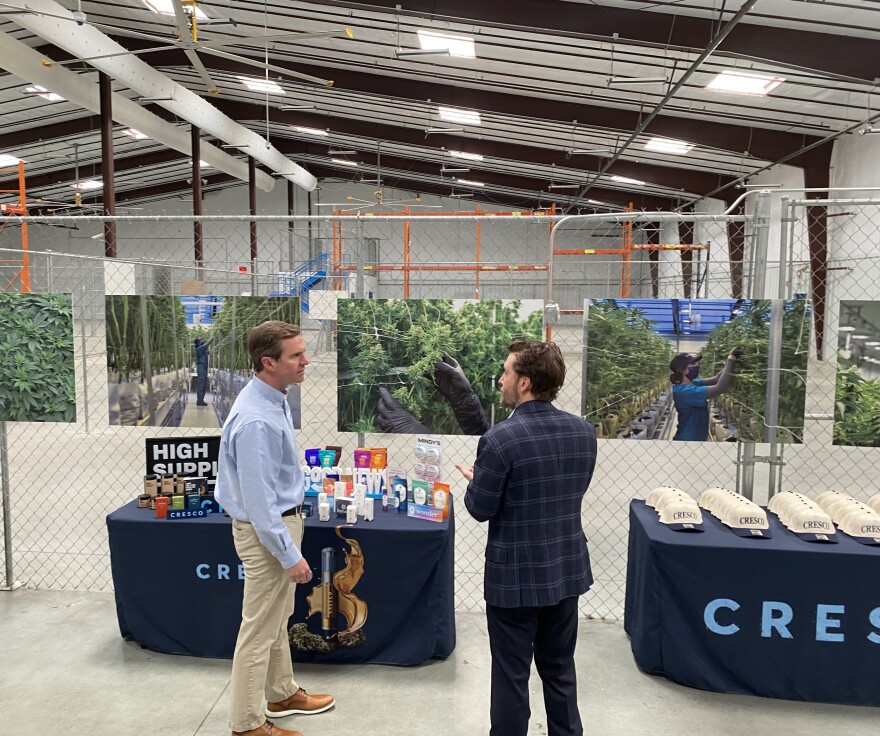 Kentucky Gov. Andy Beshear (left) speaks with Cresco Labs CEO Charlie Batchell at the ribbon-cutting ceremony of the company's new medical cannabis cultivation facility in Winchester.