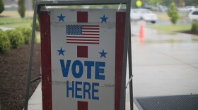 Voting sign outside polling place.