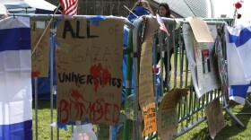 Signs posted along the perimeter of the anti-war encampment at the Massachusetts Institute of Technology.