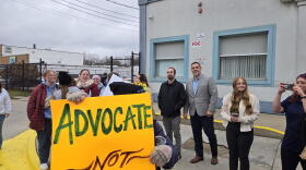 Ryan Kunzelman standing among protestors