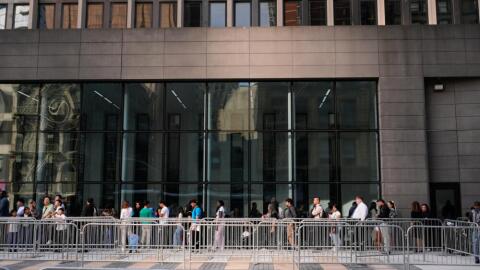 People wait in line to enter immigration courts and services in New York, Monday, July 27, 2026. (Seth Wenig/AP)