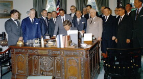President John F. Kennedy signs S. 857, authorizing establishment of the Cape Cod National Seashore Park, Aug. 7, 1961.