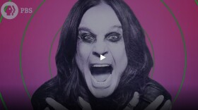 Close-up of Ozzy Osbourne screaming. 