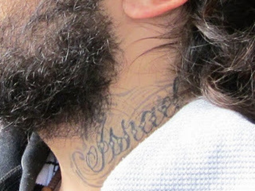 The "Israel" tattoo on Ortega-Herndandez's neck.