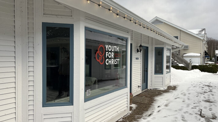 A building owned by Apollos Properties overlooking Leland’s historic Fishtown sits empty pending a federal lawsuit over Youth for Christ’s desire to open a youth ministry in the commercially zoned business district.