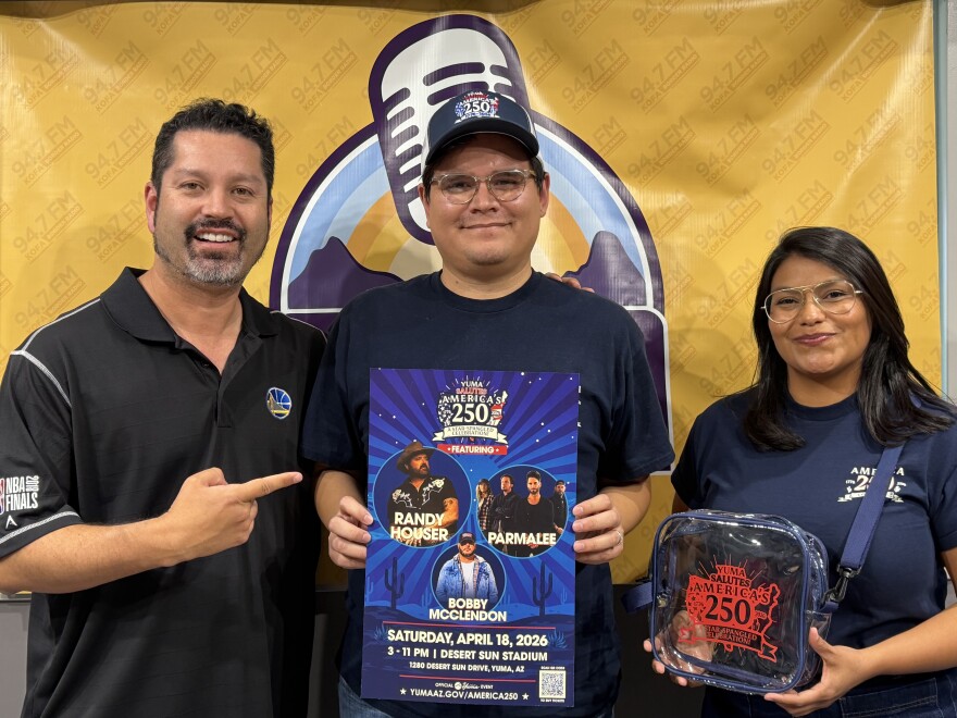 Christian Magana, center, public information officer for the City of Yuma and Ana Zolorzano, marketing specialist, invite you to the Yuma Salutes America's 250 concert on April 18. There's a clear bag rule for the event and they will have some bags for sale at the event.