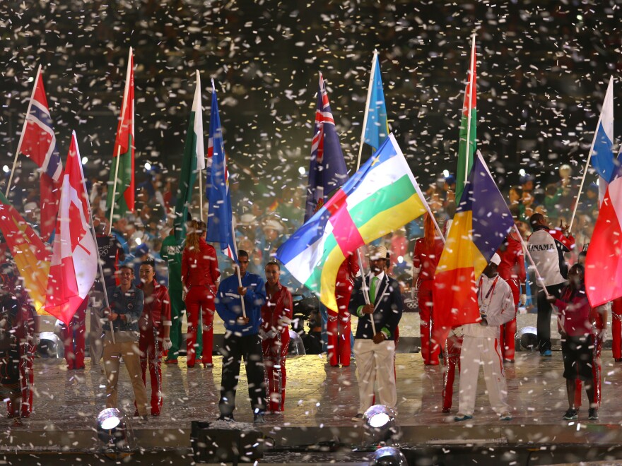 Athletes enter the stadium during the Closing Ceremony.