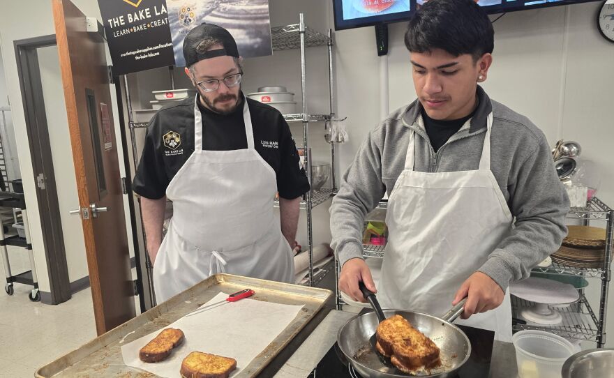 A student works with an instructor at The Bake Lab in San Antonio.