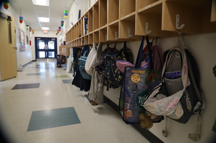 Backpacks hung in the main hall of the Chebeague Island School in May 2026.