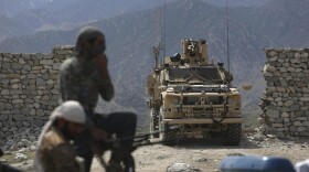 U.S. forces and Afghan security police are seen in Asad Khil near the site of a U.S. bombing in the Achin district of Jalalabad, east of Kabul, Afghanistan, Saturday, April 17, 2017. (Rahmat Gul/AP)