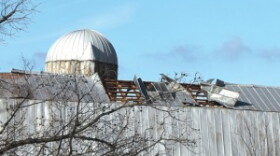 A roof on Murray Paris Road was damaged Sunday night by high winds during a severe thunderstorm. Debris from the roof were blown across the property, into trees and across the road onto another field.