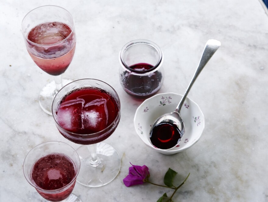 Above, a glass of traditional sorrel and the Rousseau sisters' Sorrel Mimosas (Holiday Hibiscus) made with it.