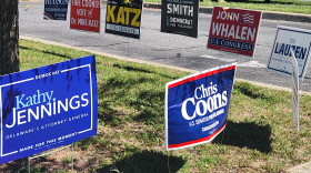 Signs for Democratic and Republican candidates at a Kent County polling location, September 15, 2026.