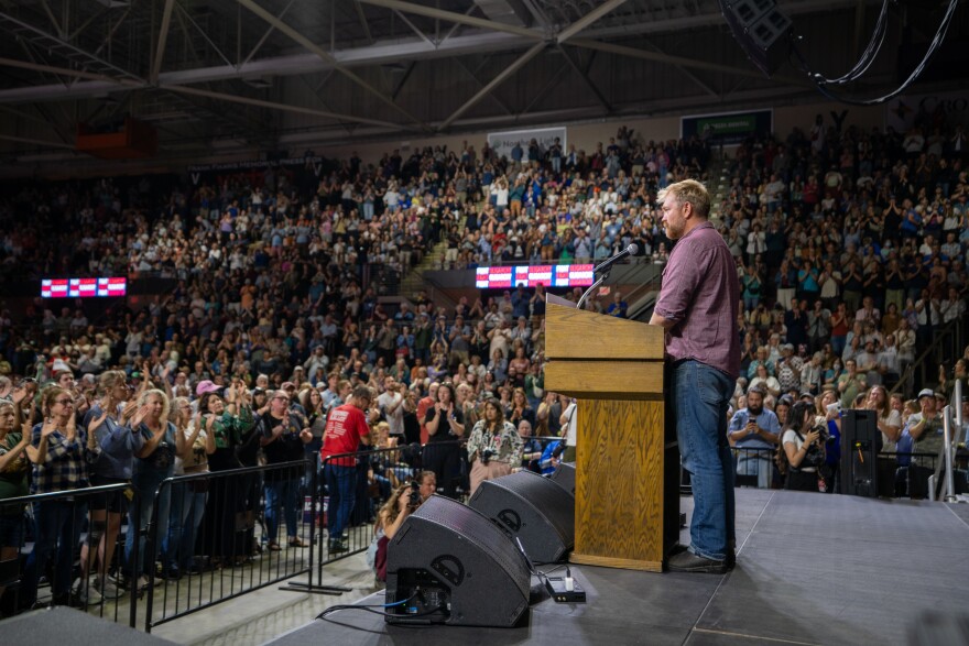 Graham Platner speaks to a crowd at the Cross Insurance Arena in Portland on Sept. 1, 2025.