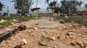 Large rocks line the path at Paseo in Hagatna following the passage of Super Typhoon Bavi on July 7, 2026.