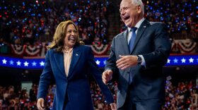 Democratic presidential candidate, U.S. Vice President Kamala Harris and Democratic vice presidential nominee Minnesota Gov. Tim Walz walk out on stage together during a campaign event in Philadelphia, Pennsylvania.