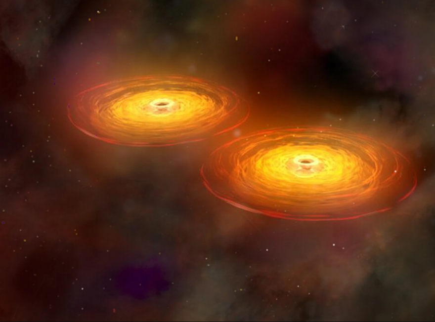 This illustration shows a stage in the merger of two galaxies that forms a single galaxy with two centrally located supermassive black holes surrounded by disks of hot gas. The black holes orbit each other for hundreds of millions of years before they merge to form a single supermassive black hole that sends out intense gravitational waves.