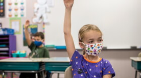 File photo of Emma Wikstrom beginning the first day of in-person class at Davis Drive Elementary in Cary, NC.