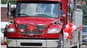 A fire truck drives down Main Street in Emerson, Manitoba as part of the Canada Day Parade on July 1 | MPR News