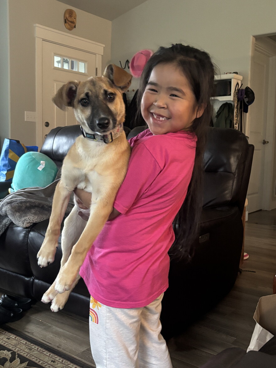 The John family thought they had lost Shiney forever in the storm, but she survived and was later reunited with her family in Anchorage. Emily was happy to see her.